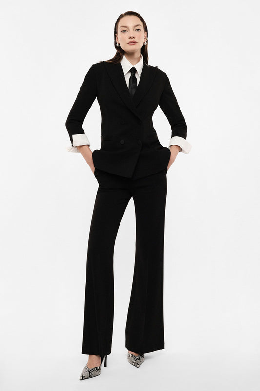 Pantaloni flare vita alta linea pulita