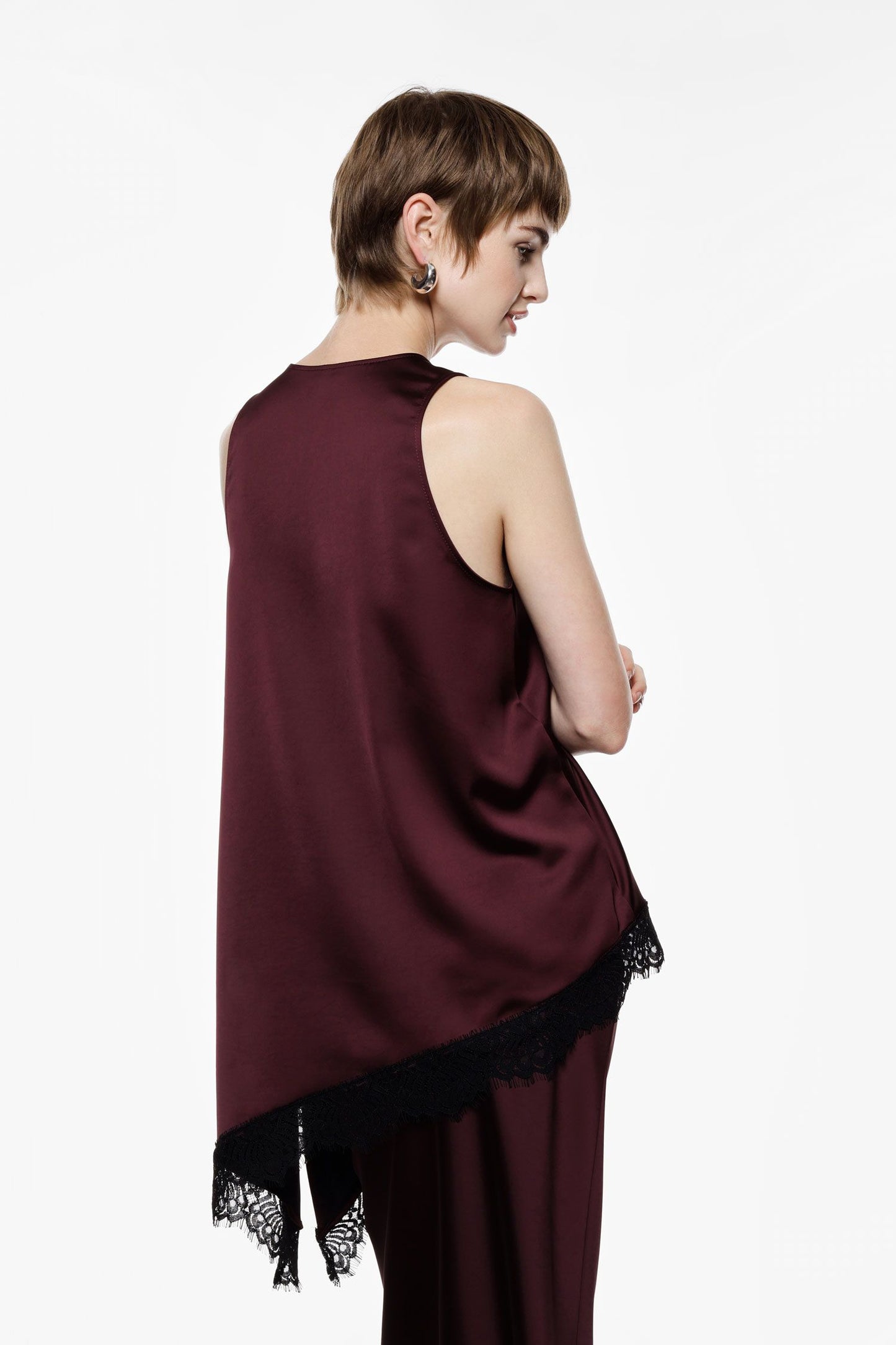 Top asimmetrico con bordo in pizzo