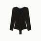 Top aderente con scollo a v e maniche lunghe