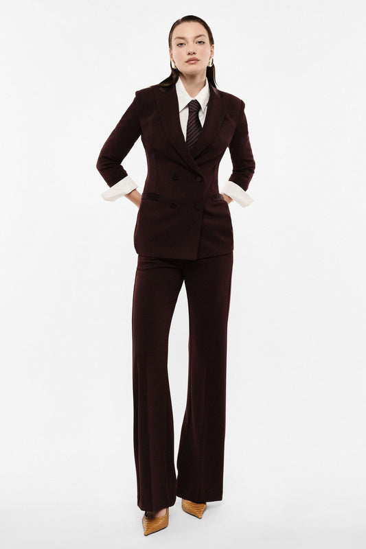 Pantaloni flare vita alta linea pulita