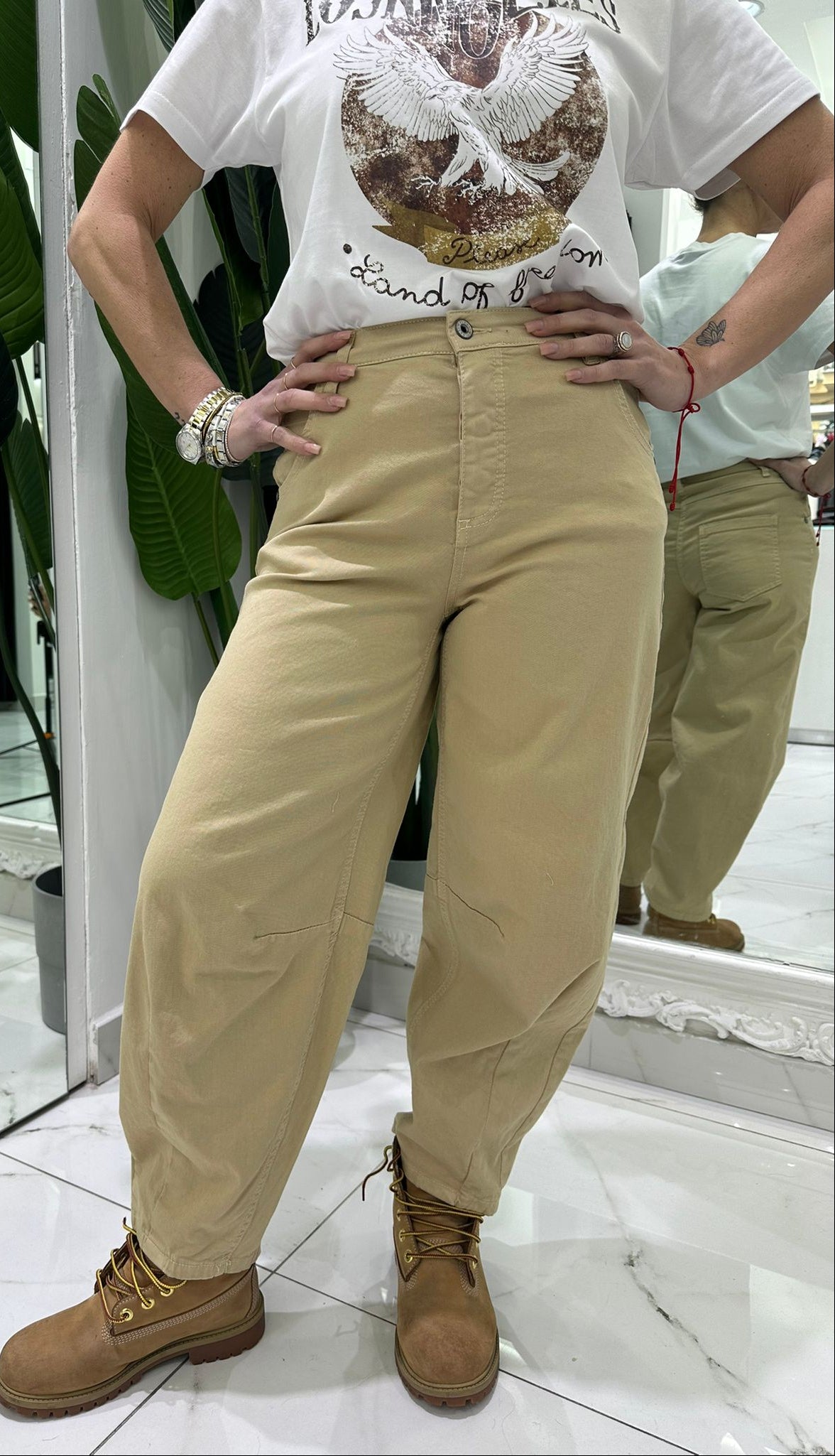 Pantaloni ampi vita alta con tasche