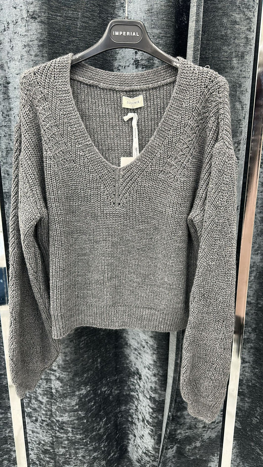 maglia di lana con scollo a v con manica morbida  lunga