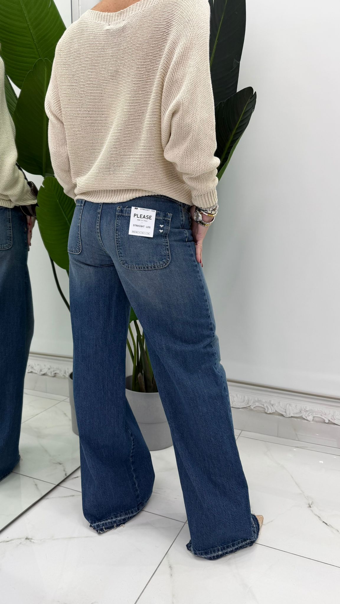 Jeans a gamba ampia con dettagli effetto vissuto