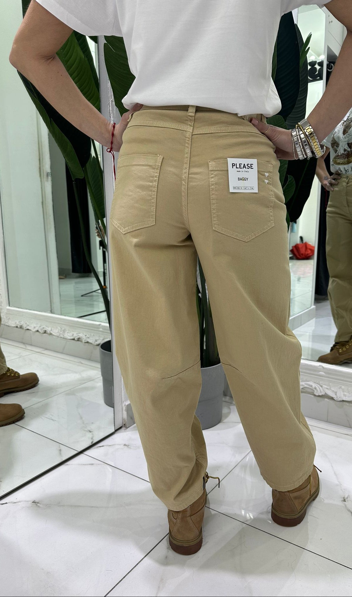 Pantaloni ampi vita alta con tasche