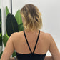 Top corto halter con spalline incrociate