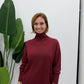 Maglione turtleneck con collo alto e polsini ampi