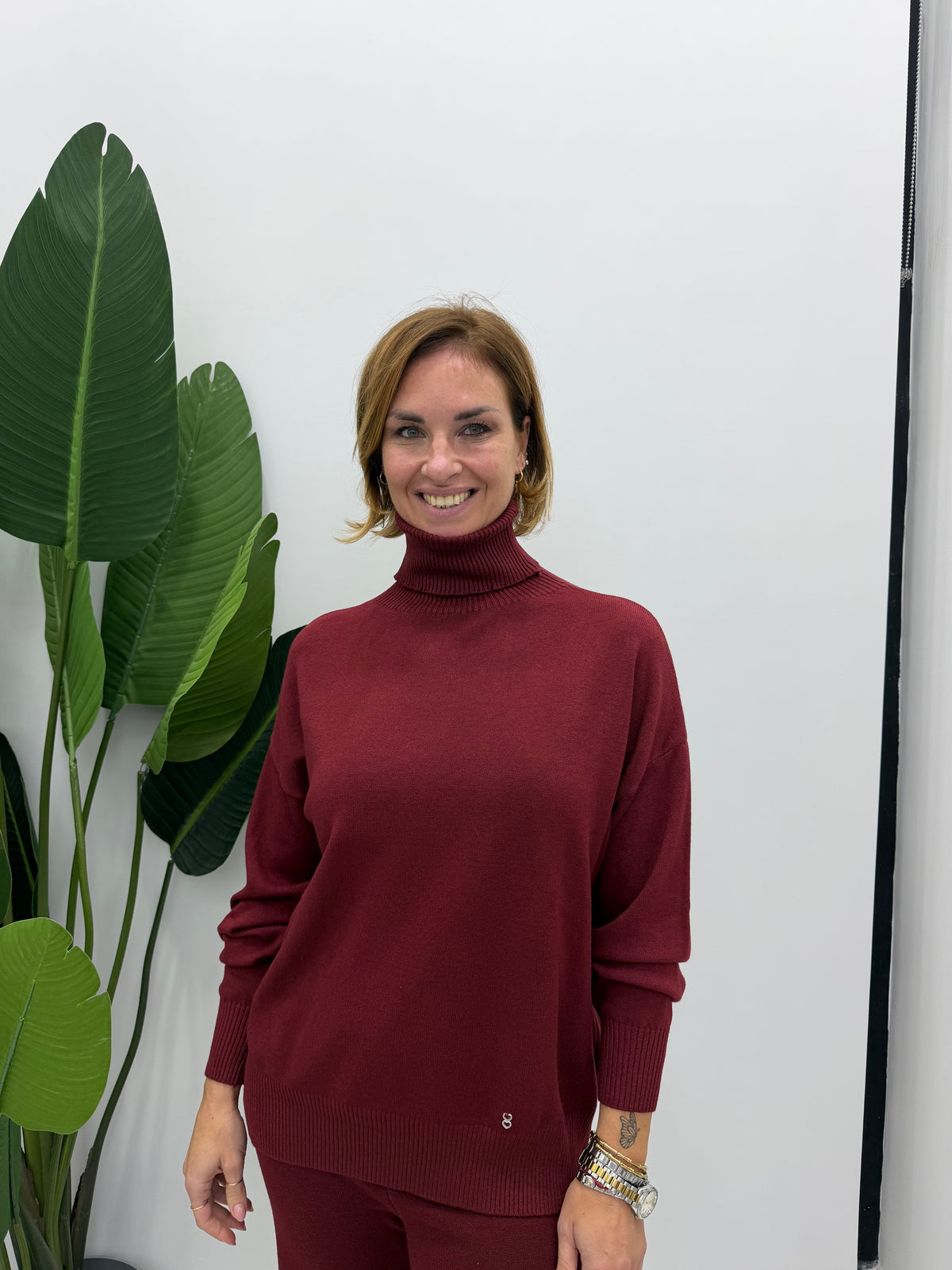 Maglione turtleneck con collo alto e polsini ampi