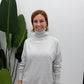 Maglione turtleneck con collo alto e polsini ampi