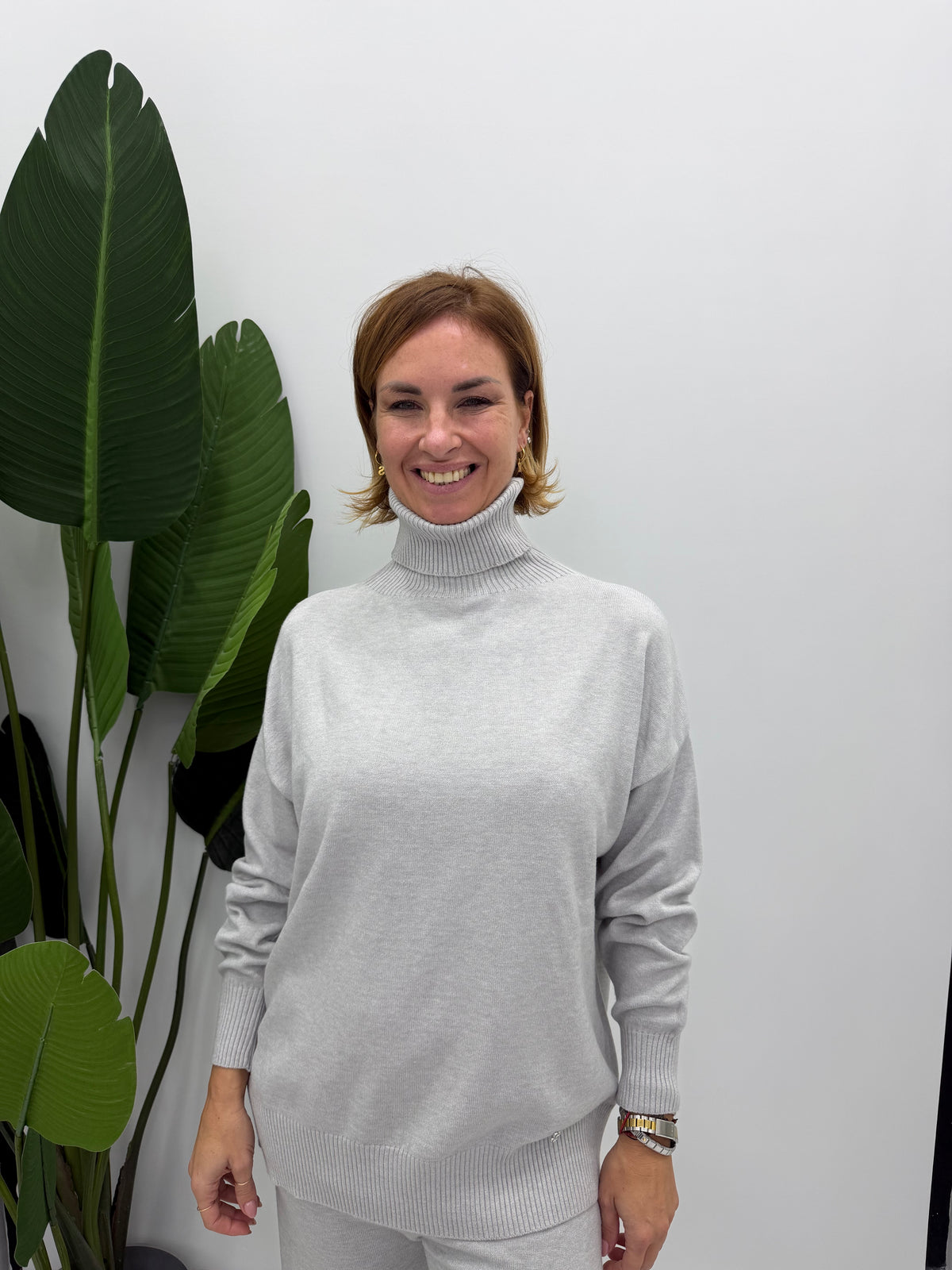 Maglione turtleneck con collo alto e polsini ampi
