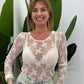 Top trasparente a maniche lunghe con ricamo floreale