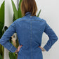Jumpsuit corta con tasche frontali e maniche lunghe