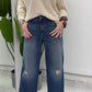 Jeans a gamba ampia con dettagli effetto vissuto
